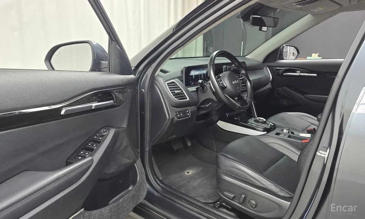 Фото 11 - Kia Seltos