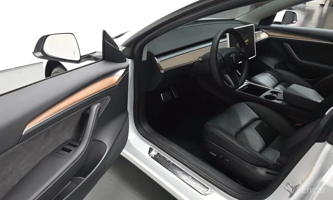 Фото 11 - Tesla Model 3