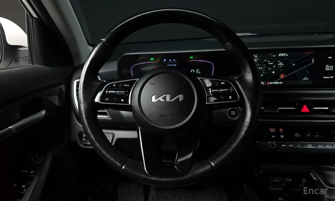 Фото 13 - Kia Seltos