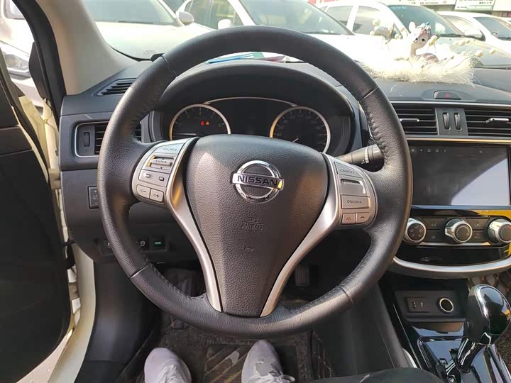 Фото 11 - Nissan Tiida