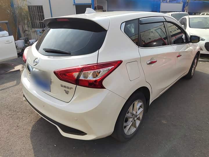 Фото 7 - Nissan Tiida