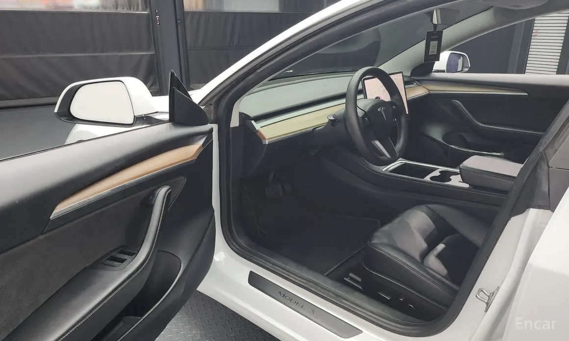 Фото 10 - Tesla Model 3