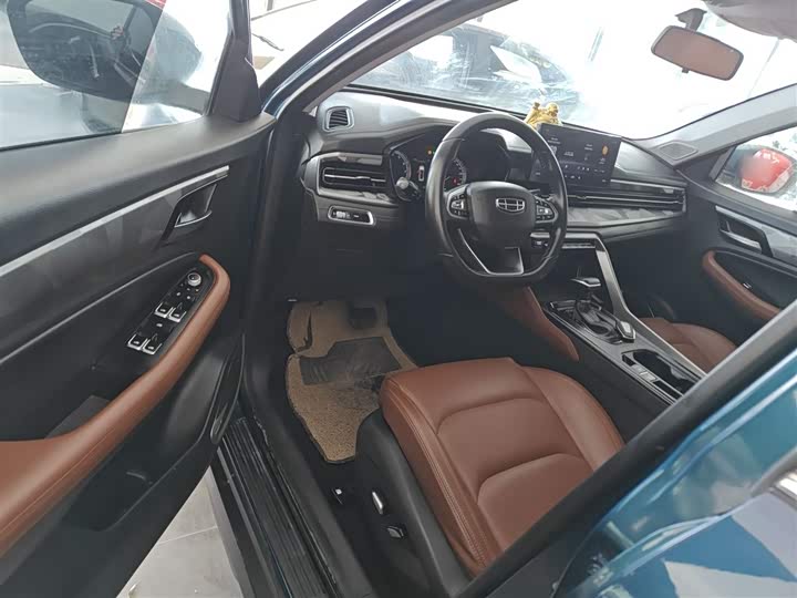 Фото 16 - Geely Vision X6