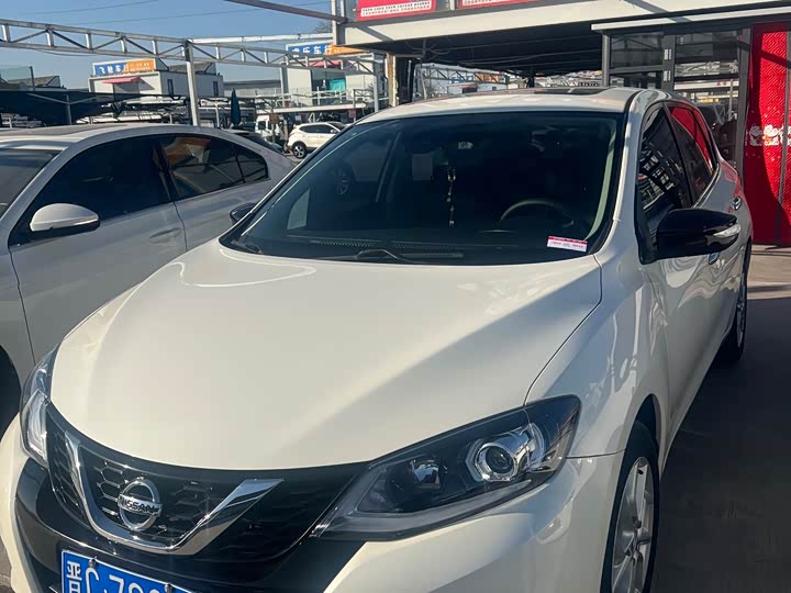 Фото 1 - Nissan Tiida