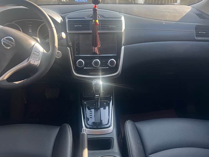 Фото 11 - Nissan Tiida