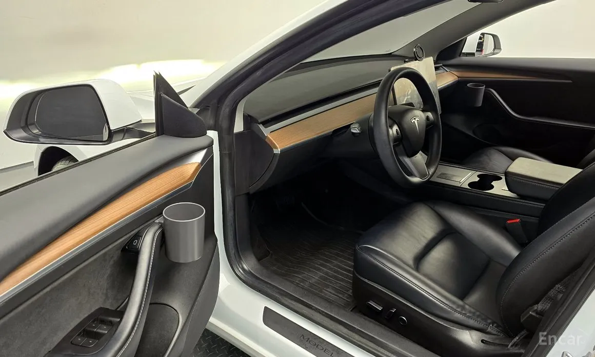 Фото 11 - Tesla Model 3