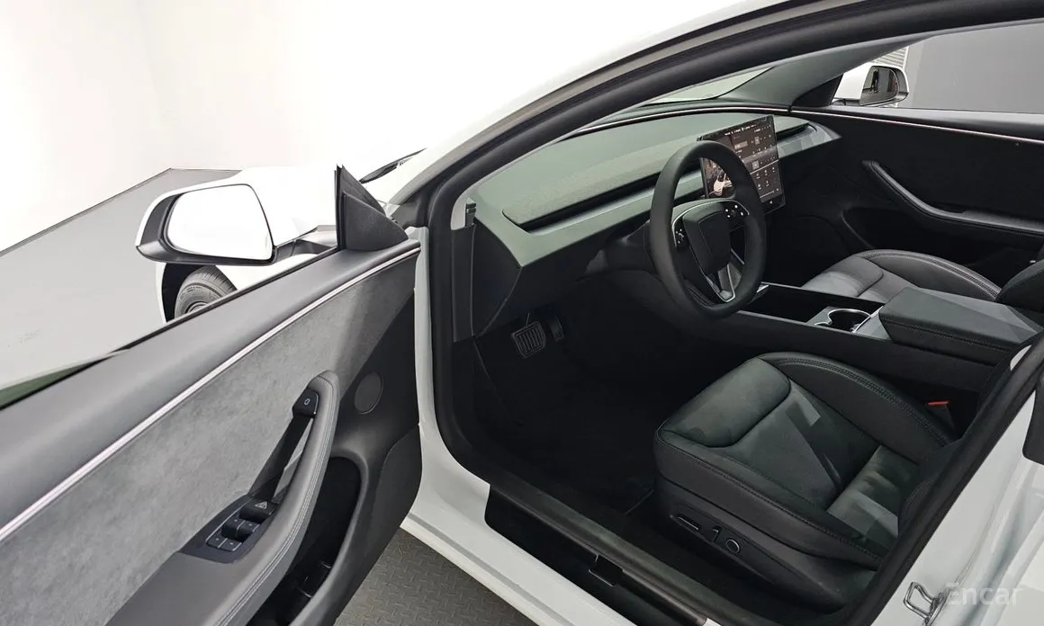 Фото 11 - Tesla Model 3