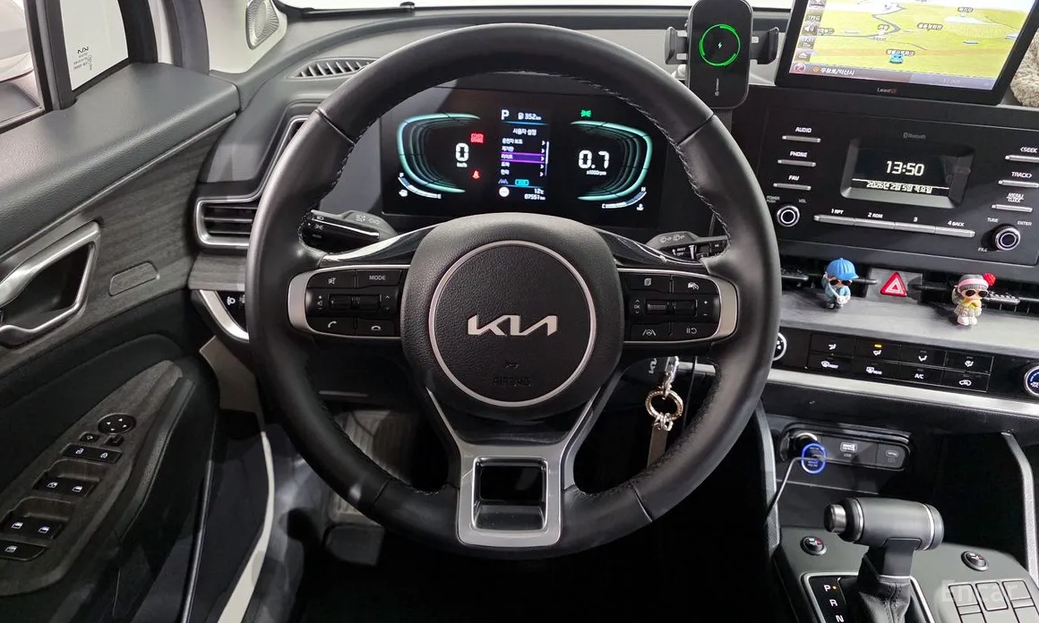 Фото 14 - Kia Sportage