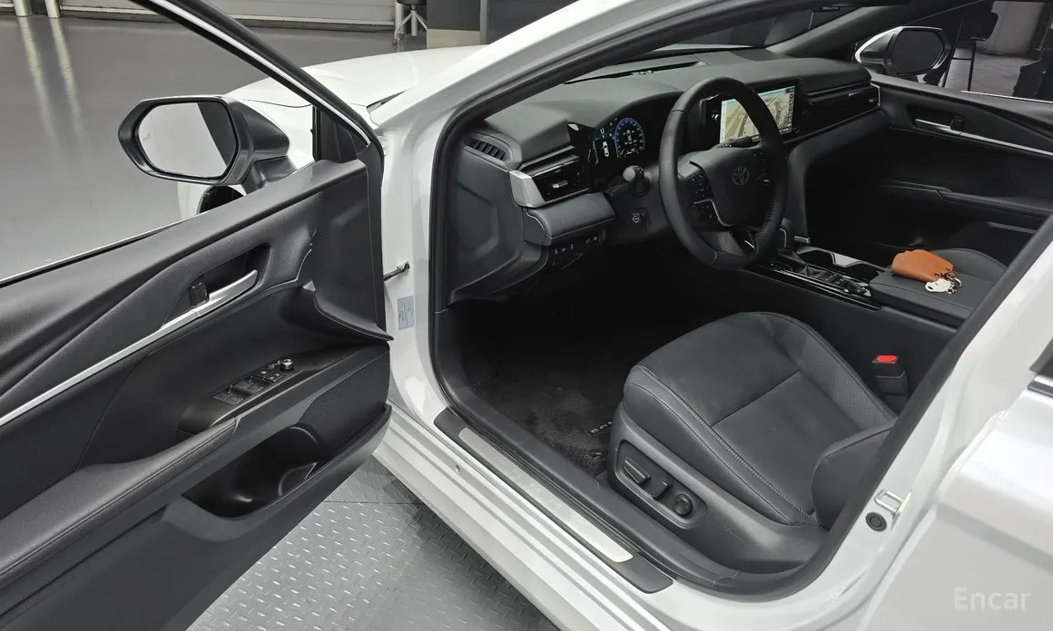 Фото 11 - Toyota Camry