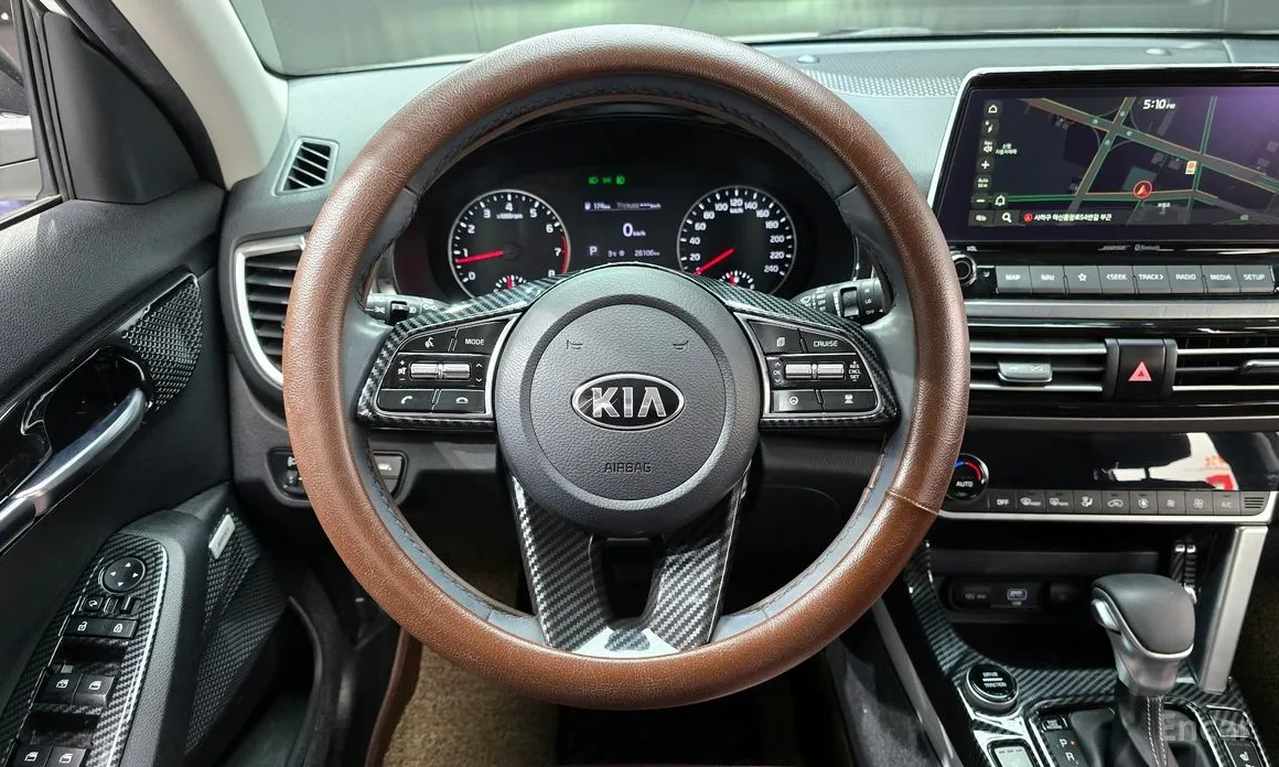 Фото 13 - Kia Seltos