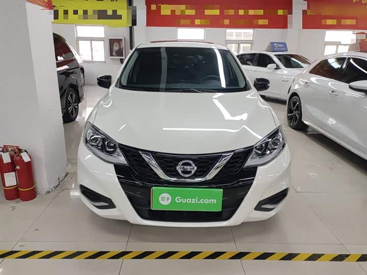 Фото 3 - Nissan Tiida