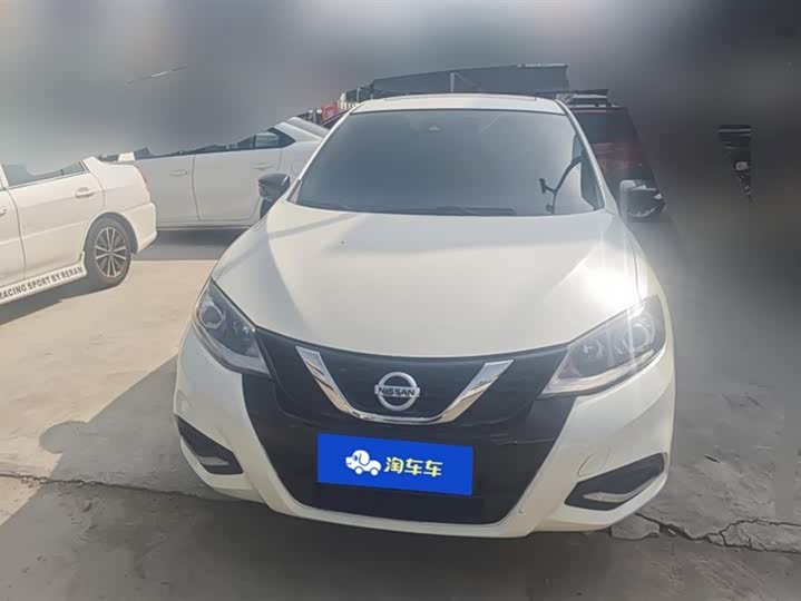 Фото 2 - Nissan Tiida