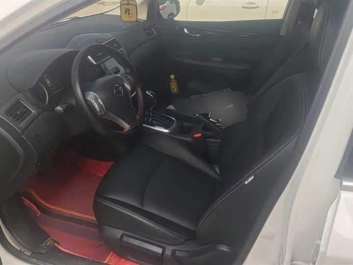 Фото 9 - Nissan Tiida