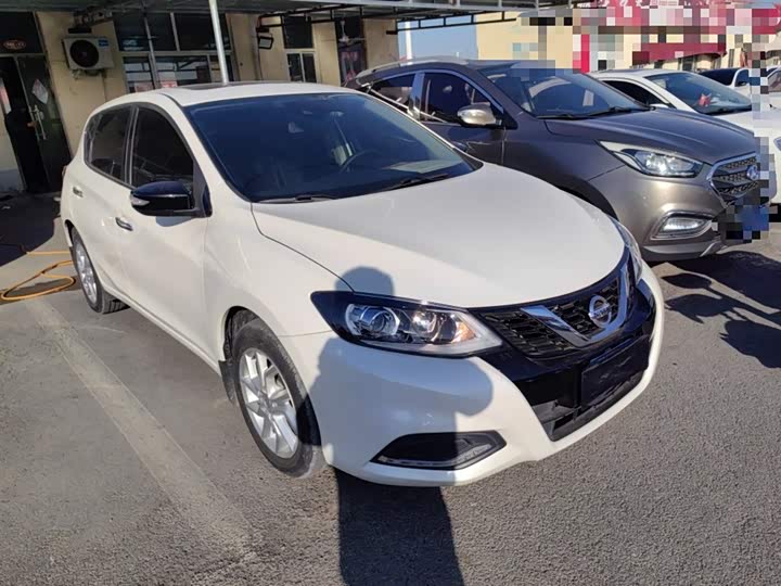 Фото 4 - Nissan Tiida