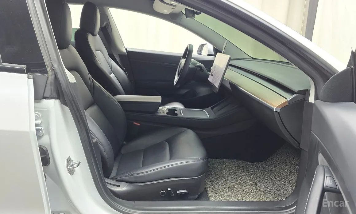 Фото 11 - Tesla Model 3