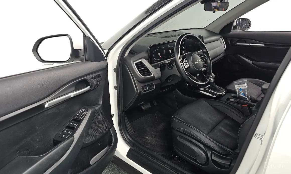 Фото 11 - Kia Seltos