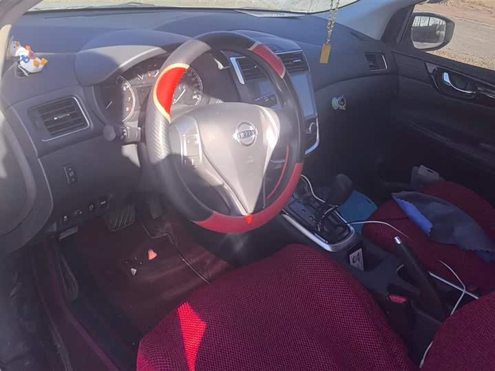 Фото 9 - Nissan Tiida