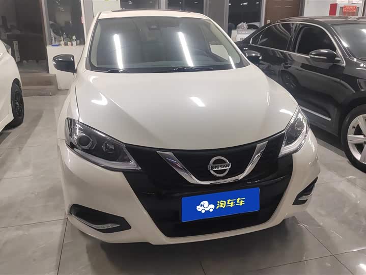 Фото 2 - Nissan Tiida