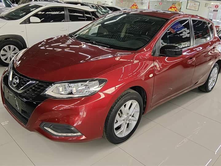 Фото 1 - Nissan Tiida