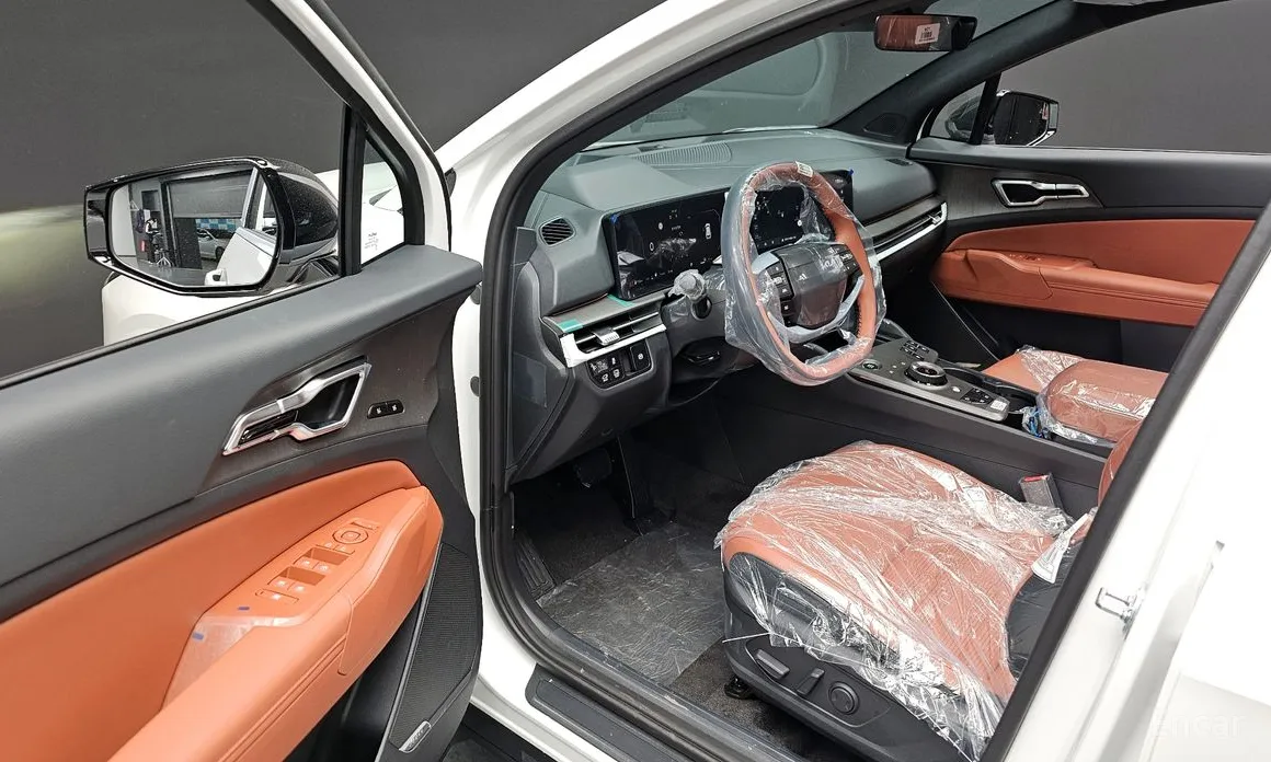 Фото 12 - Kia Sportage