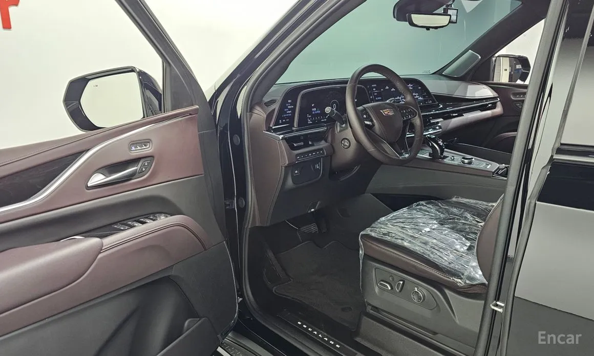 Фото 10 - Cadillac Escalade