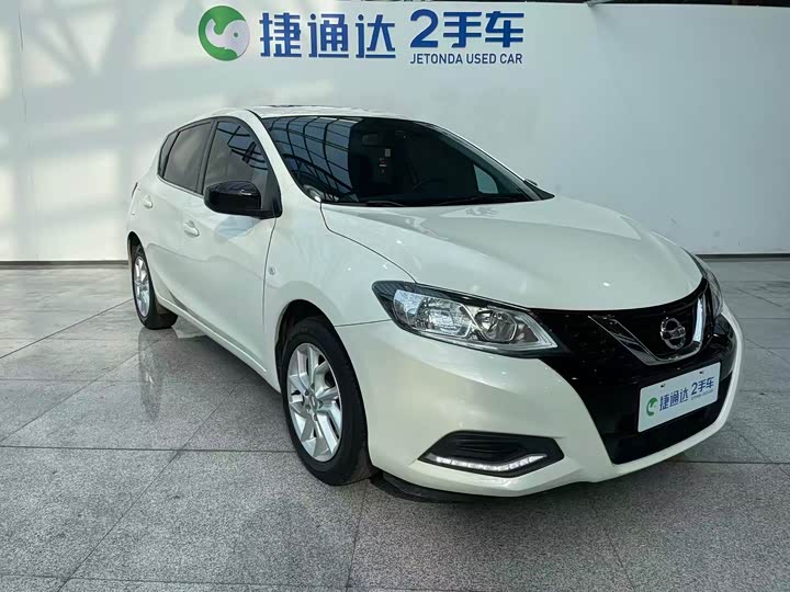 Фото 9 - Nissan Tiida