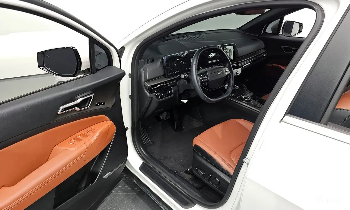 Фото 11 - Kia Sportage