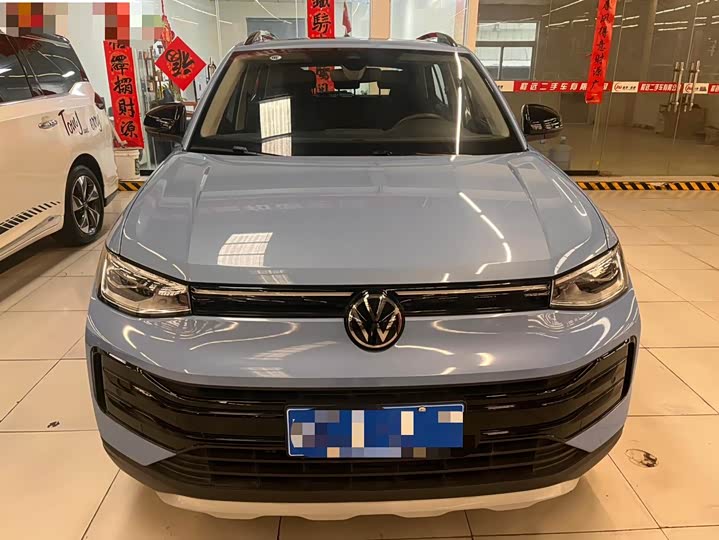 Фото 2 - Volkswagen Tharu