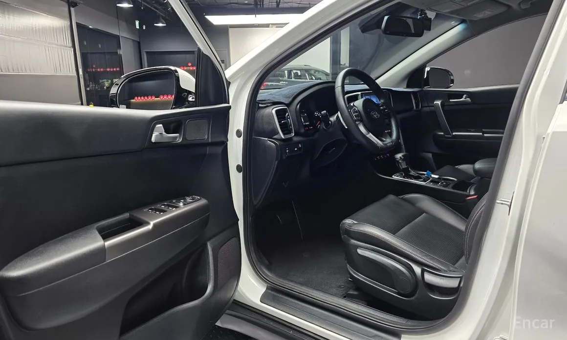 Фото 11 - Kia Sportage