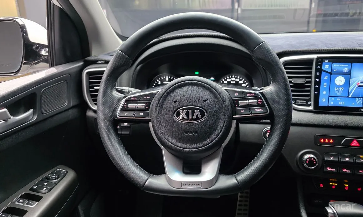 Фото 13 - Kia Sportage