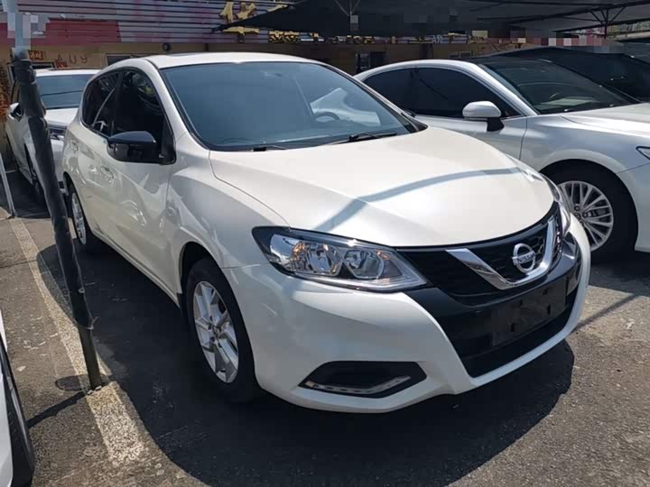 Фото 4 - Nissan Tiida