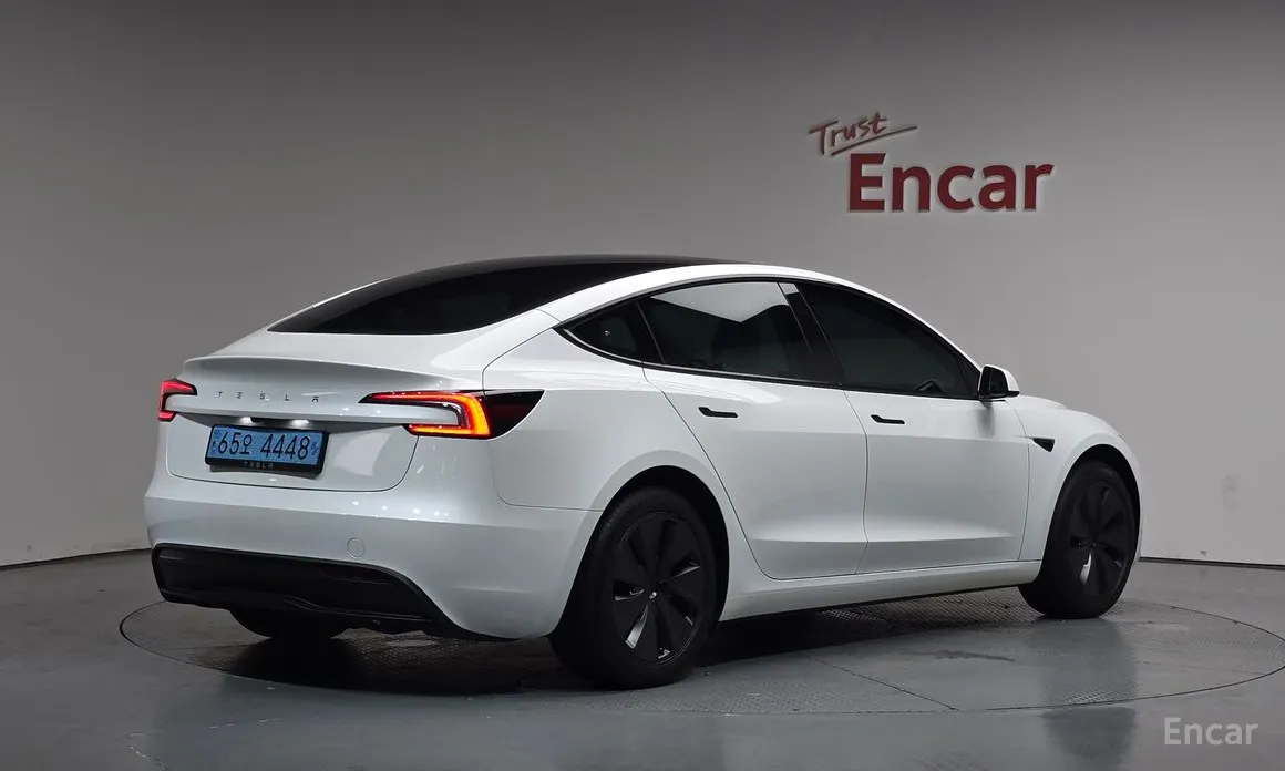 Photo 2 - Tesla Model 3